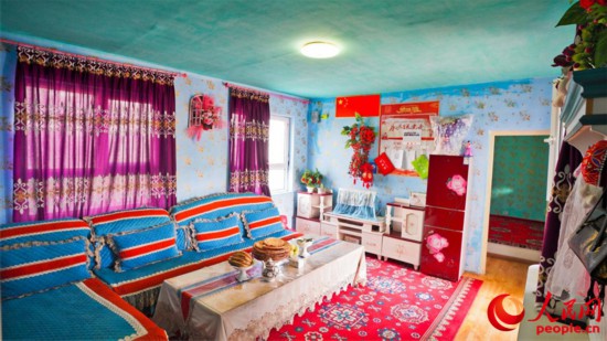 达里雅布依村搬迁后的民居。人民网 李欣洋 达里雅布依村搬迁后的民居。人民网 李欣洋